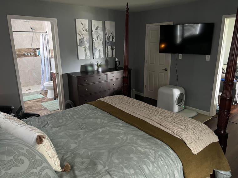 Bathroom door facing the bed