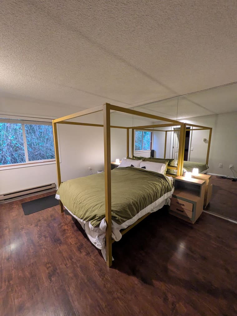 Mirror facing the bed