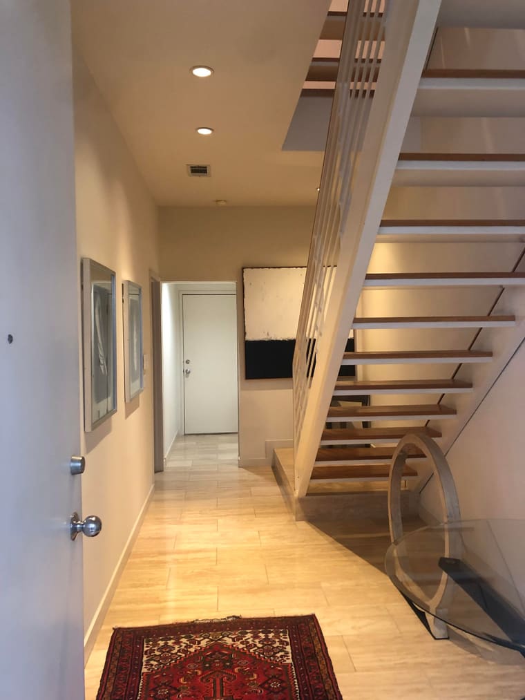 Front door facing a bedroom door